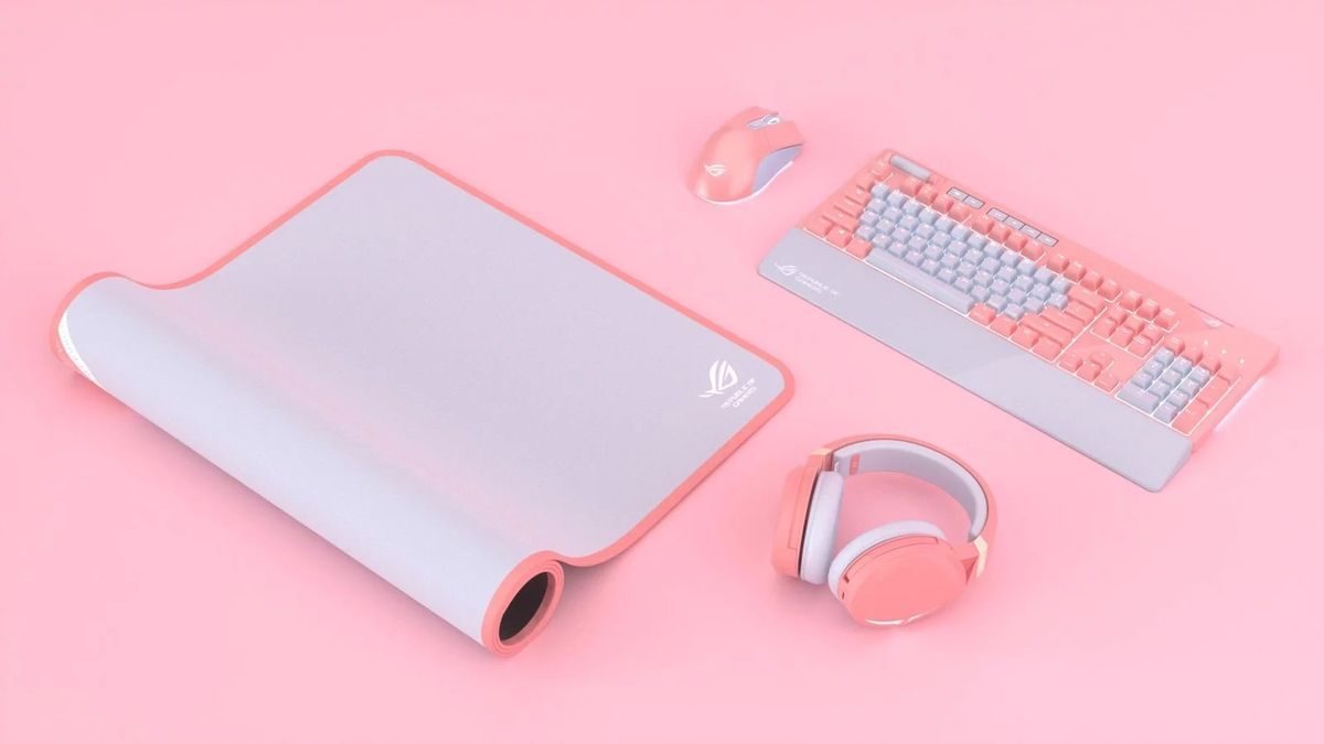 Perangkat gaming ASUS ROG PNK LTD berwarna pink, termasuk keyboard, mouse, dan headset untuk gamer stylish