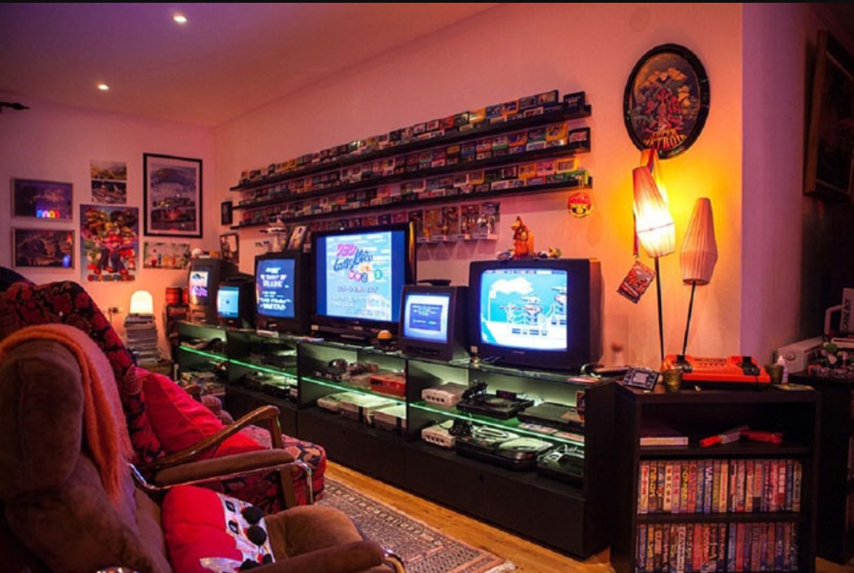Inspirasi Setup Ruang Gaming Minimalis Modern Setup ruang gaming nyaman dengan lampu RGB dan kursi ergonomis