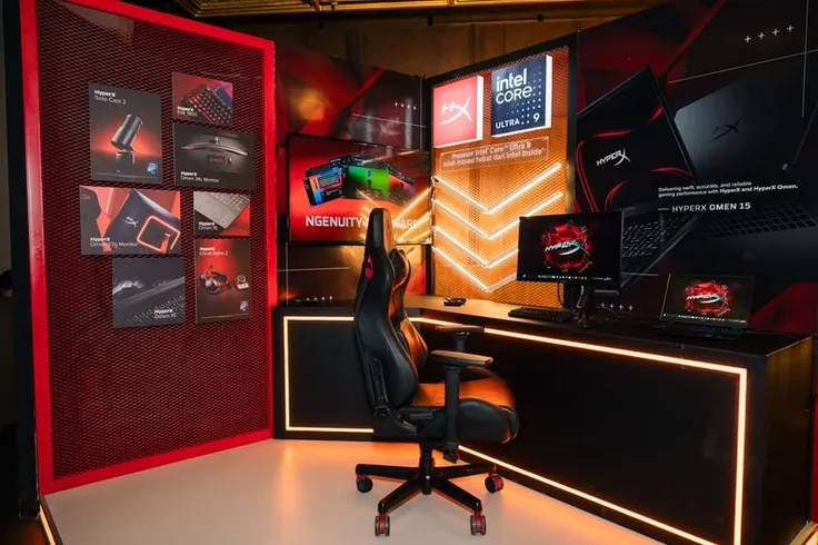 Pemain menikmati teknologi game modern dengan grafis futuristik dan perangkat gaming canggih